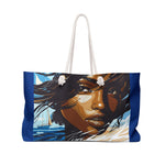 Tote bag with a design of a woman's face and a sailboat on a blue background