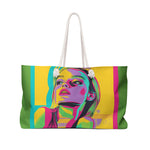 Colorful tote bag with a graphic design of a woman's face on a white background