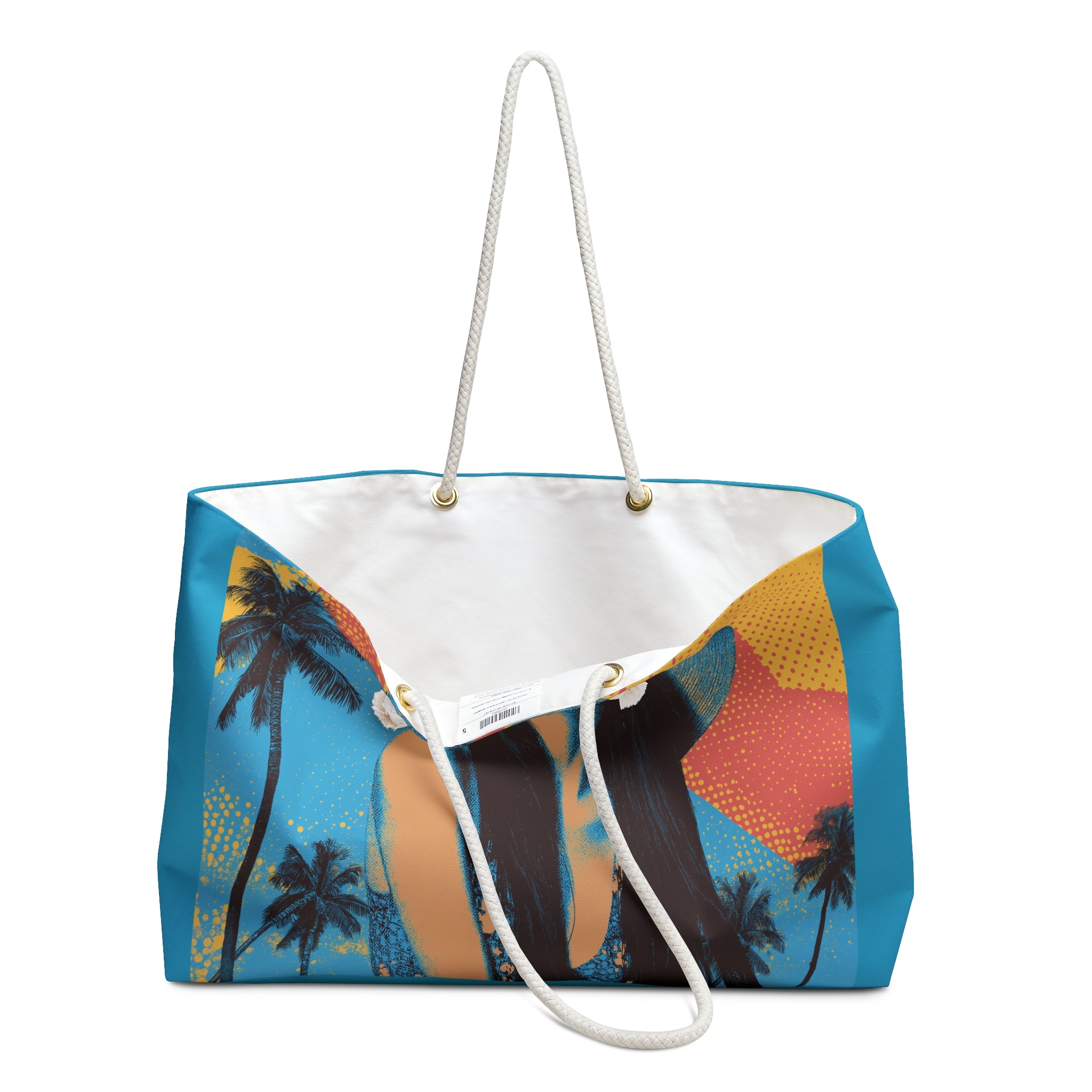 Tote bag with tropical design featuring palm trees and a beach scene on a white background